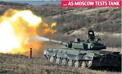  ?? ?? ... AS MOSCOW TESTS TANK
Firepower: Russian troops carry out trials on tank weapons which may be used in Ukraine