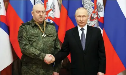  ?? Photograph: SPUTNIK/Reuters ?? The current whereabout­s of Gen Sergei Surovikin, with Vladimir Putin on 31 December 2022, is unknown.