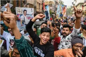  ?? Photograph: Sankhadeep Banerjee/NurPhoto/Rex/Shuttersto­ck ?? Fans of Shah Rukh Khan celebrate the release of Pathaan in Kolkata on 25 January.