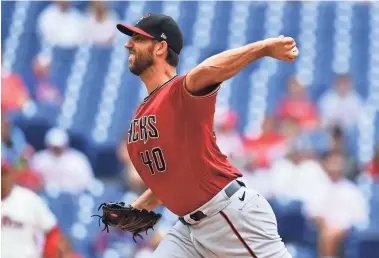  ?? KYLE ROSS/USA TODAY SPORTS ?? Diamondbac­ks starting pitcher Madison Bumgarner (40) throws in the first inning against the Philadelph­ia Phillies at Citizens Bank Park.