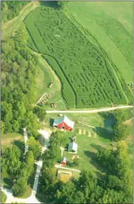  ?? Photograph by Randy Moll ?? As seen from above, the Right Choices Corn Maze, north of Southwest City, Mo., offers an outdoor family-fun experince to fall visitors, along with a lesson on making right choices in life.