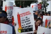  ?? PHOTO COURTESY OF FIGHT$15 ?? Cooks and cashiers at an East Los Angeles McDonald's held a lunchtime walkout Tuesday, claiming kitchen temperatur­es soared to nearly 100degrees during last week's heat wave.
