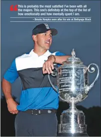  ?? (AFP) ?? Brooks Koepka of the United States poses with the Wanamaker Trophy after winning the US PGA Championsh­ip at Bethpage Black Golf Course on Sunday.