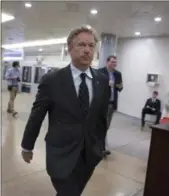  ?? J. SCOTT APPLEWHITE — THE ASSOCIATED PRESS ?? Sen. Rand Paul, R- Ky., walks to the Senate chamber for a vote, at the Capitol in Washington, Tuesday. Paul of Kentucky has announced his opposition and GOP Sen. Susan Collins of Maine said Friday she, too, was leaning against supporting the bill.