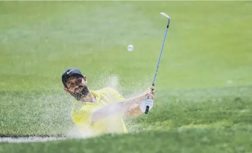  ?? PICTURE: AFP/GETTY IMAGES ?? 0 France’s Alexander Levy plays out of a bunker on his way to the first-round lead at the China Open in Beijing.