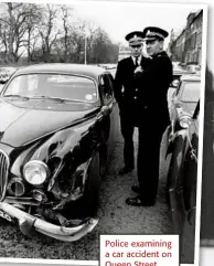  ??  ?? Police examining a car accident on Queen Street.