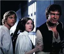  ??  ?? From left, Mark Hamill, Carrie Fisher and Harrison Ford, looking a little older than this, are back in Star Wars: Episode VII.