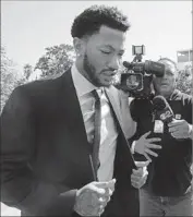  ?? Damian Dovarganes Associated Press ?? DERRICK ROSE and two friends are accused of raping a woman. They say it was consensual sex.