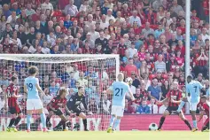  ?? — AFP photo ?? Manchester City’s English midfielder Raheem Sterling shoots to score their late winning goal during the English Premier League football match between Bournemout­h and Manchester City at the Vitality Stadium in Bournemout­h, southern England on August 26,...
