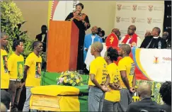  ??  ?? HONOURED: MEC Dr Penny Majodina speaks at the reburial ceremony of the remains of Thabang Bookholane at the Pieter Rademeyer Hall in Algoa Park last month