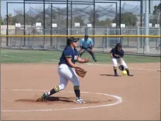  ??  ?? Calipatria High’s Delaney Hernandez delivers a pitch during the Hornets’ CIF San Diego Section Div. IV playoff games against Mission Vista on Tuesday afternoon. KARINA LOPEZ PHOTO