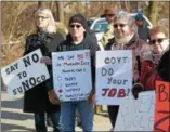  ?? PETE BANNAN – DIGITAL FIRST MEDIA ?? Local residents hold a protest against the Mariner East pipeline project at Michele Drive. and Ship Road in West Whiteland Saturday afternoon.