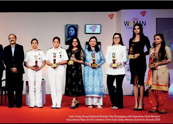  ?? CHANDRADEE­P KUMAR ?? Photograph­s by &amp; RAJWANT RAWAT India Today Group Editorial Director Raj Chengappa with Rajasthan Chief Minister Vasundhara Raje and the winners of the India Today Woman Summit &amp; Awards 2018