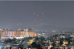  ??  ?? UNDER ATTACK: Syrian air defences respond to Israeli missiles targeting south of the capital Damascus last week.