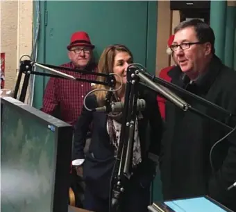  ?? BOSTON HERALD FILE ?? PLEADING OUT: Former state Rep. David Nangle, at right with Lt. Gov. Karyn Polito in a radio studio, pleaded guilty Wednesday to 23 federal fraud charges.