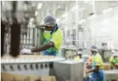  ??  ?? Hard at work … (from top, clockwise) making ice cream at Laga Industries; Chey Scovell, the chief executive of the Manufactur­ers Council of PNG; beer from SP Brewery; PNG springs.