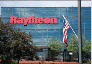  ?? (AP) ?? A Raytheon facility in Woburn, Mass., is shown in this file photo. Raytheon’s stock fell 1.5% on Tuesday after the announceme­nt that the company will be kicked out of the Dow Jones Industrial Average.