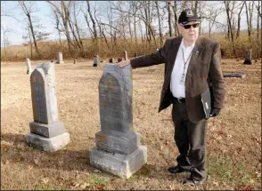  ?? NWA Democrat-Gazette/FLIP PUTTHOFF ?? Glenn Jones, chairman of the Benton County Historical Commission, talks Wednesday about the history of the Goad Springs Cemetery during a tour.