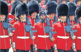  ?? AP ?? Guardsman Charanpree­t Singh Lall of the Coldstream Guards wears a turban as he takes part in the Colonel’s Review, the final rehearsal for Trooping the Colour, the Queen’s birthday parade, in London.