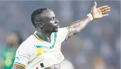  ?? Picture: AFP ?? ROARING. Senegal’s Sadio Mane celebrates after scoring a goal during their Africa Cup of Nations Group C match against Cameroon in Yamoussouk­ro last night.
