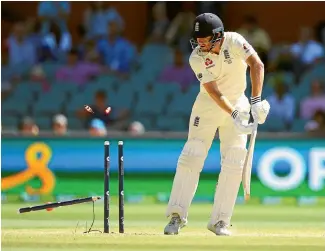  ?? PHOTO GETTY IMAGES ?? England’s Jonny Bairstow is bowled by Mitchell Starc.