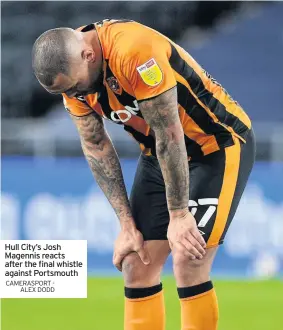  ?? CAMERASPOR­T - ALEX DODD ?? Hull City’s Josh Magennis reacts after the final whistle against Portsmouth