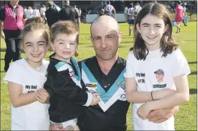  ?? Picture: PAUL CARRACHER ?? MAJOR MILESTONE: Nick Pickering, who celebrated his 300th senior game with Swifts last week, had his children Charli, 8, Bobby, 4, and Torah, 11, join him for a guard of honour.