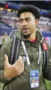  ?? Photo ?? AlabamaAP quarterbac­k
Former Bryce Young talks on the field during the NFL scouting combine in Indianapol­is on Saturday.