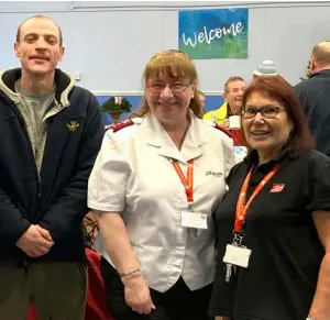  ?? ?? Christina Marinomi, artist Aaron, Corps Officer Captain Jan Howlin, and community centre welcome visitors to the first Cafe Refresh Exhibition of Talents. PIcture: Emma Merchant.