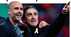  ?? Reuters ?? Symbol: Pep Guardiola and assistant Manuel Estiarte display their yellow ribbons