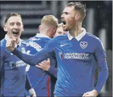  ?? Picture: PinPeP ?? MAN OF THE MOMENT Pompey captain Tom Naylor celebrates his goal against Peterborou­gh United.