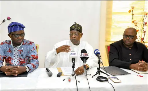  ??  ?? Minister of Informatio­n and Culture, Alhaji Lai Mohammed (middle), flanked by his two Special Assistants, Mr Williams Adeleye (left) and Mr Segun Adeyemi (right), during a press briefing on Nigeria's hosting of the UNWTO/CAF meeting in Lagos