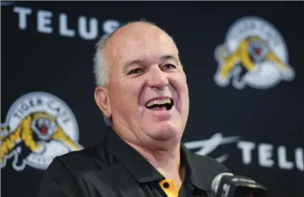  ?? SCOTT GARDNER, THE HAMILTON SPECTATOR ?? New Hamilton Tiger-Cats head coach June Jones held his first news conference Friday after being named to the top coaching spot the day before.