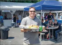  ?? PHOTO COURTESY WHITELAW PRESBYTERI­AN CHURCH ?? People enjoy good food at the 2018Whitel­aw Old Home Day.