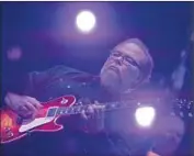  ?? Brian van der Brug
Los Angeles Times ?? STEELY DAN’S Walter Becker gives the Coachella crowd a different kind of beat on opening day Friday.