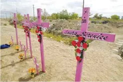  ??  ?? CIUDAD JUAREZ, Mexico: This file photo taken on October 12 2003 shows wooden crosses in a waste land at the place where the corpses of eight women were found murdered in 2001. — AFP