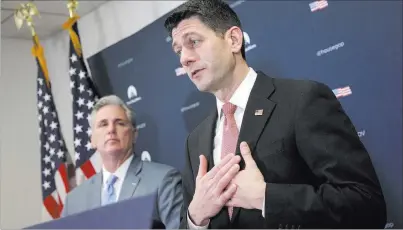  ?? J. SCOTT APPLEWHITE/ THE ASSOCIATED PRESS ?? House Speaker Paul Ryan, joined by fellow Republican and Majority Leader Kevin McCarthy, talks about getting past last week’s failure to pass a bill to replace Obamacare so the majority party in Congress can restore unity.