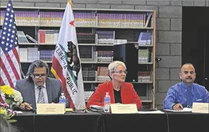  ?? PHOTO GARY REDFERN ?? U.S. Energy Secretary Jennifer M. Granholm is flanked by Calipatria City Manager Rom Medina (right) and Calipatria High School Principal Joe Derma III during a forum Wednesday at the school.