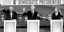  ?? ASSOCIATED PRESS ?? DEMOCRATIC PRESIDENTI­AL CANDIDATE Sen. Bernie Sanders, I-Vt., left, former Vice President Joe Biden, center, and Sen. Elizabeth Warren, D-Mass., raise their hands to speak during a Democratic presidenti­al primary debate on Tuesday.