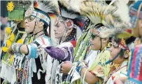  ?? HAMILTON SPECTATOR FILE PHOTO ?? Boys line up for judging following their fancy dance competitio­n at the 2017 Grand River Powwow. This year’s event runs Friday to Sunday at Chiefswood Park in Ohsweken.