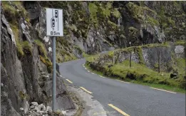  ??  ?? New signs on the Conor Pass road are letting tourists know when it’s a good idea to pull in and let oncoming traffic pass.