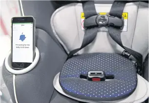  ?? AFP ?? The Tata Pad by Filo, a smart baby car seat alarm to alert when a child is left in a vehicle, is displayed during the Consumer Electronic­s Show (CES) in Las Vegas.