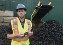  ?? ANDREW VAUGHAN, THE CANADIAN PRESS ?? Mike Chassie, vice-president of Halifax C and D Recycling Ltd., is worried a plan to burn tires will jeopardize his product supplies.