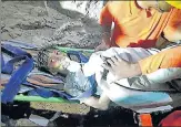 ?? HT ?? Rescuers carry Rahul Sahu to safety on Tuesday.