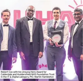  ??  ?? Robert Cox with his Unsung Hero Award for Calderdale and Huddersfie­ld NHS Foundation Trust in the IT & Digital category. PIC: Martin Hambleton