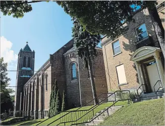  ?? ANDREJ IVANOV WATERLOO REGION RECORD ?? The Hamilton diocese hopes to redevelop the empty Sacred Heart convent and school beside the Sacred Heart Church in Kitchener.
