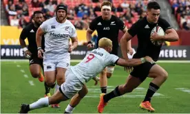  ?? AFP/Getty Images Photograph: Andrew Caballero-Reynolds/ ?? Will Jordan of the All Blacks breaks with the ball during the 1874 Rugby Cup match against the USA at FedEx Field in Landover, Maryland.