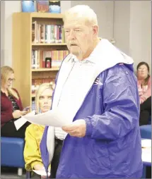  ?? Brodie Johnson • Times-Herald ?? The Palestine-Wheatley School District presented its annual report to the public Monday in the library on the high school campus. PWHS Principal Randy Cannon gives his report during the meeting, saying the district can do better than a C.