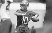  ?? JOE RONDONE/ASSOCIATED PRESS ?? FSU redshirt freshman QB Bailey Hockman worked with the second-team offense during practice on Monday.