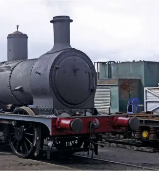  ?? ABOVE RIGHT: JOHN SAGAR ?? Final reassembly under way inside the East Lancashire Railway’s one-time L&Y shed at Bury Baron Street on July 25 last year, with the saddle tank trial-fitted and the new chimney casting being craned onto the smokebox.